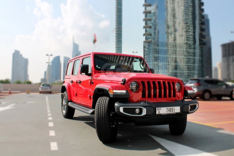 rood Jeep Wrangler Unlimited Sahara-editie 2019 for rent in Dubai 1