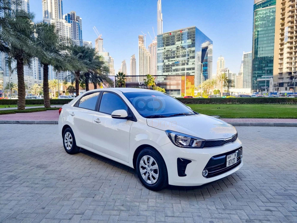 White Kia Pegas 2022 for rent in Dubai 1