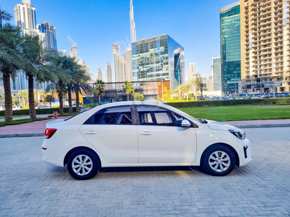 White Kia Pegas 2022 for rent in Dubai 4