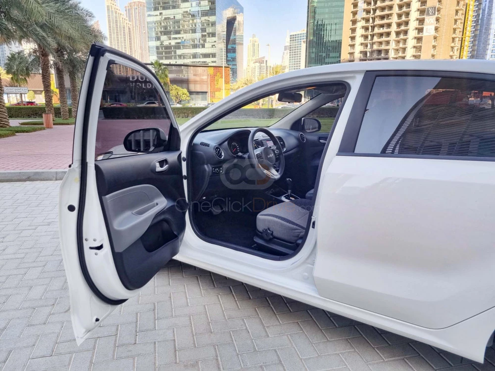White Kia Pegas 2022 for rent in Abu Dhabi 8