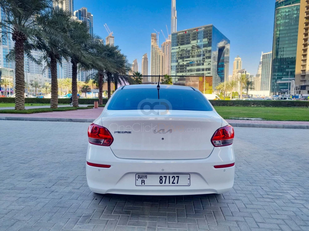 White Kia Pegas 2022 for rent in Dubai 11