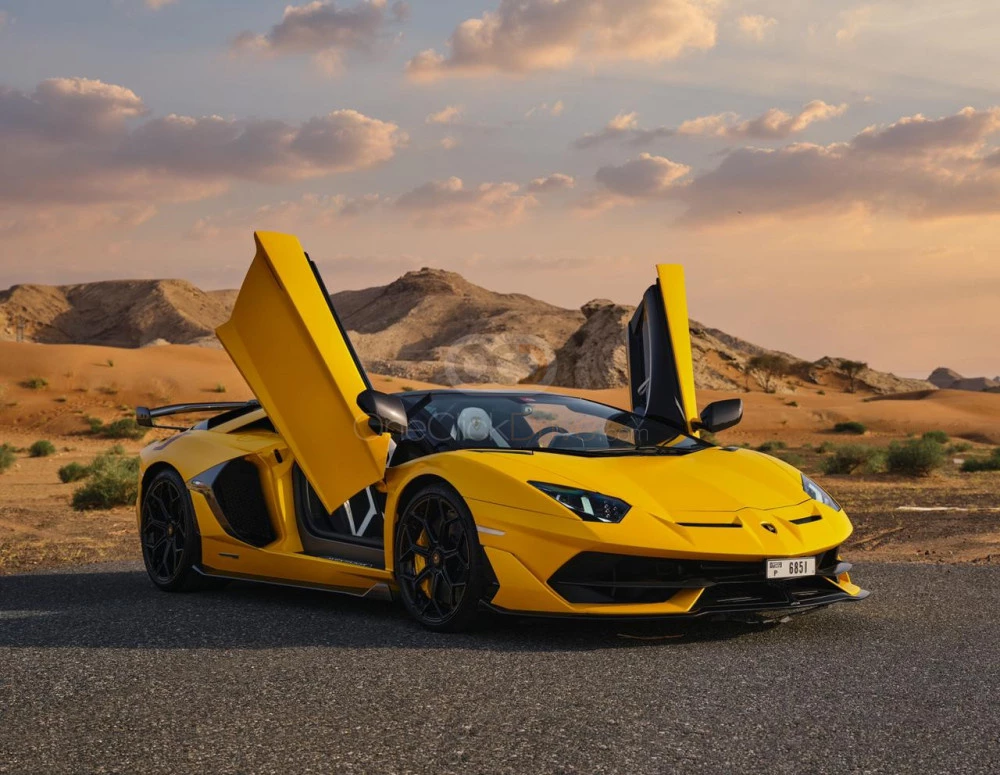 Sarı Lamborghini Aventador SVJ Roadster 2022 for rent in Dubai 1