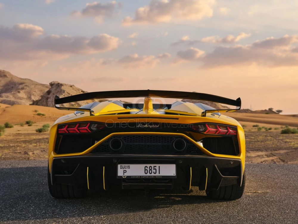 Sarı Lamborghini Aventador SVJ Roadster 2022 for rent in Dubai 5