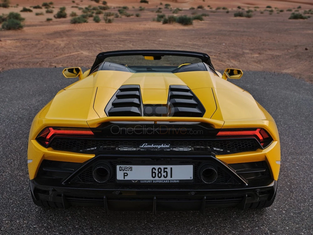 Yellow Lamborghini Huracan Evo Spyder 2021 for rent in Dubai 4