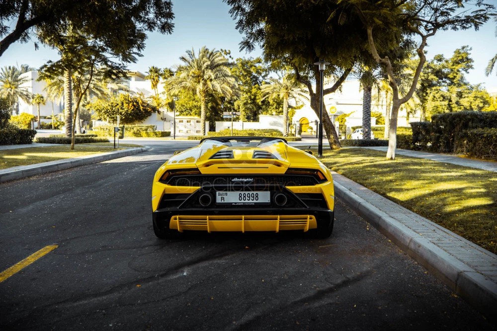 Yellow Lamborghini Huracan Evo Spyder 2022 for rent in Dubai 7