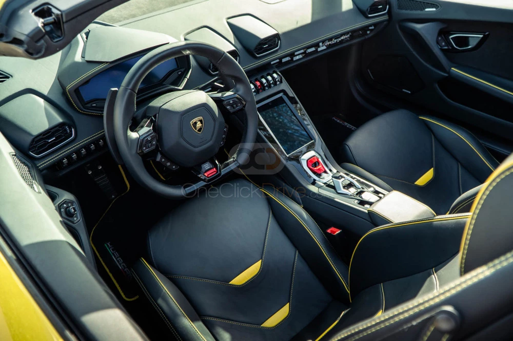 Amarillo Lamborghini Huracan Evo Spyder 2022 for rent in Dubai 4