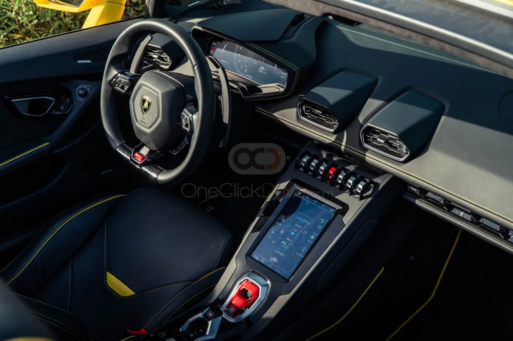Sarı Lamborghini Huracan Evo Spyder 2022 for rent in Dubai 6