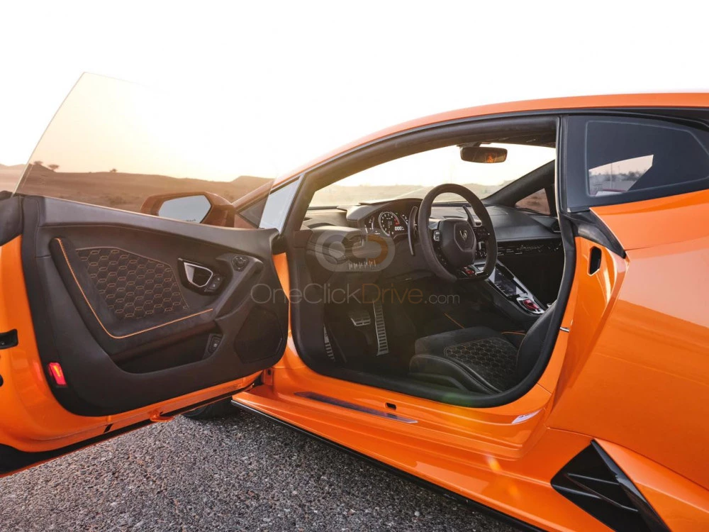 Orange Lamborghini Huracan Evo 2021 for rent in Abu Dhabi 5