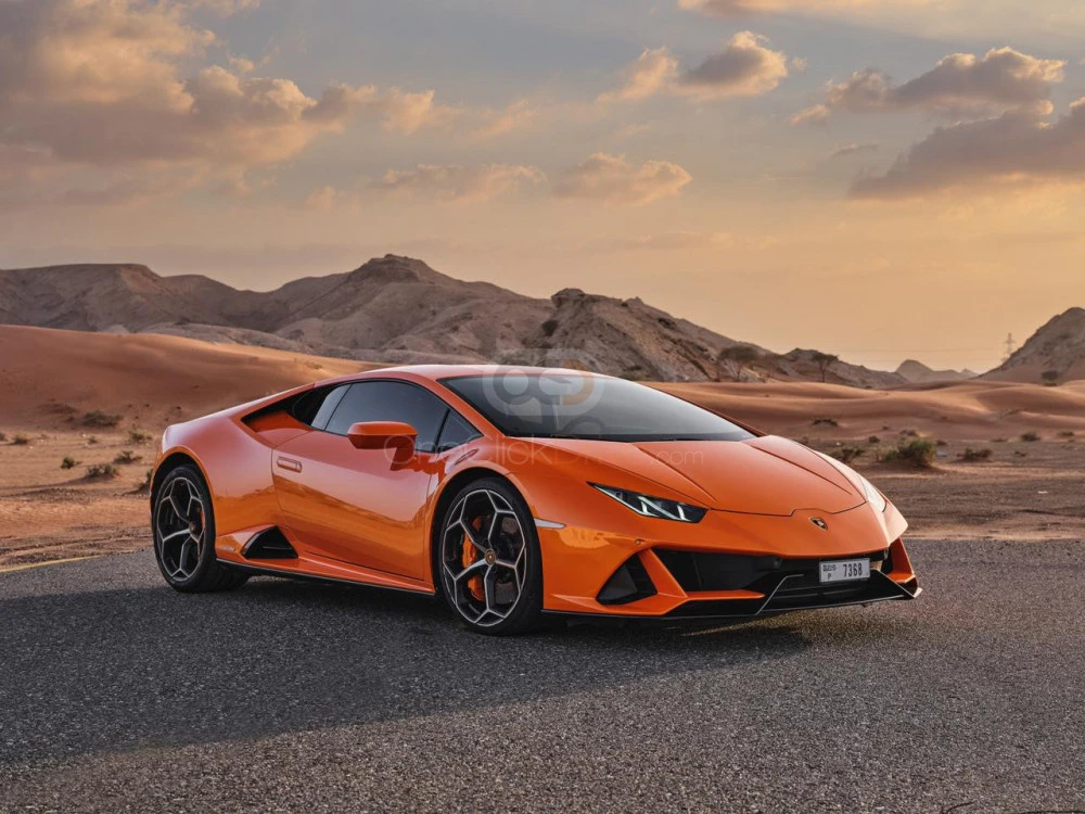 Orange Lamborghini Huracan Evo 2021 for rent in Abu Dhabi 1