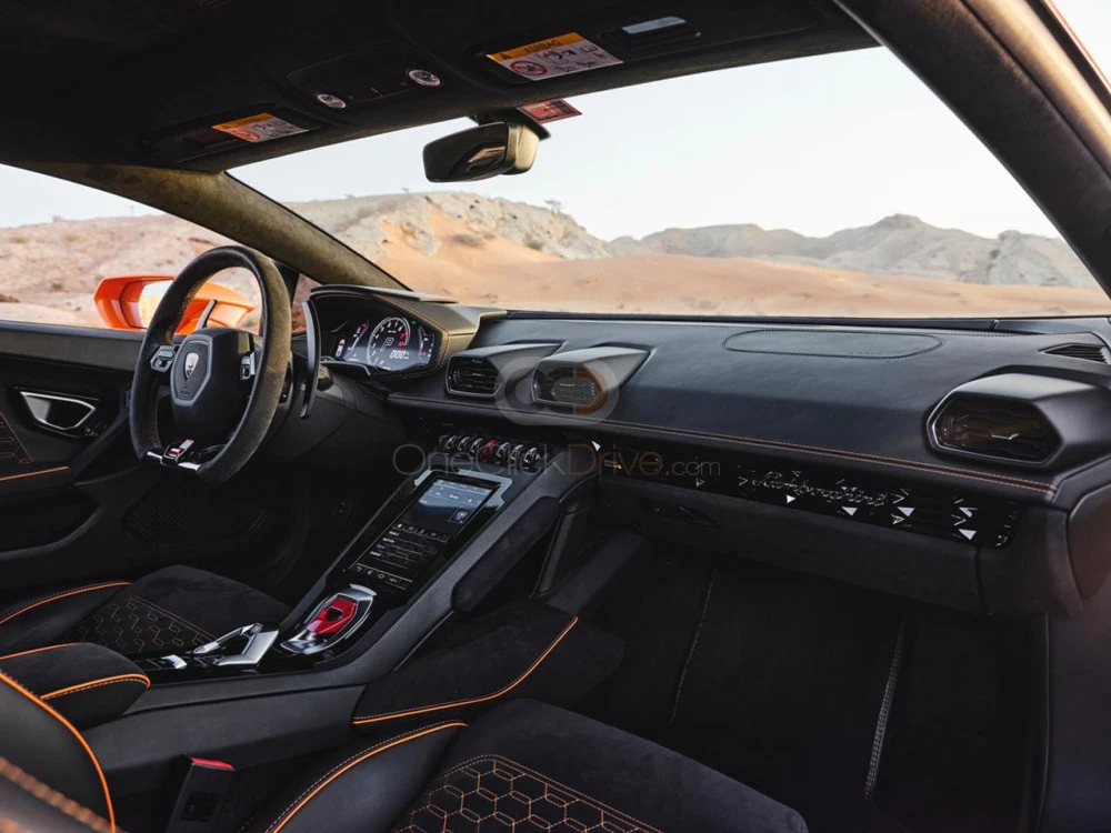 Orange Lamborghini Huracan Evo 2021 for rent in Abu Dhabi 7