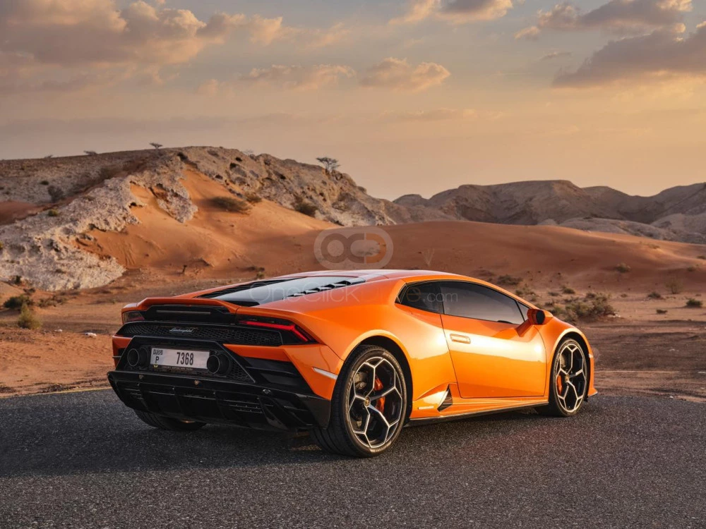 Orange Lamborghini Huracan Evo 2021 for rent in Abu Dhabi 2