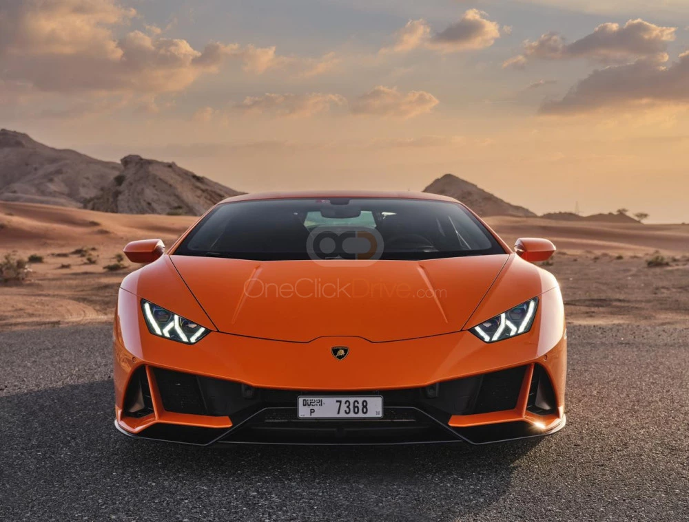 Orange Lamborghini Huracan Evo 2021 for rent in Abu Dhabi 3