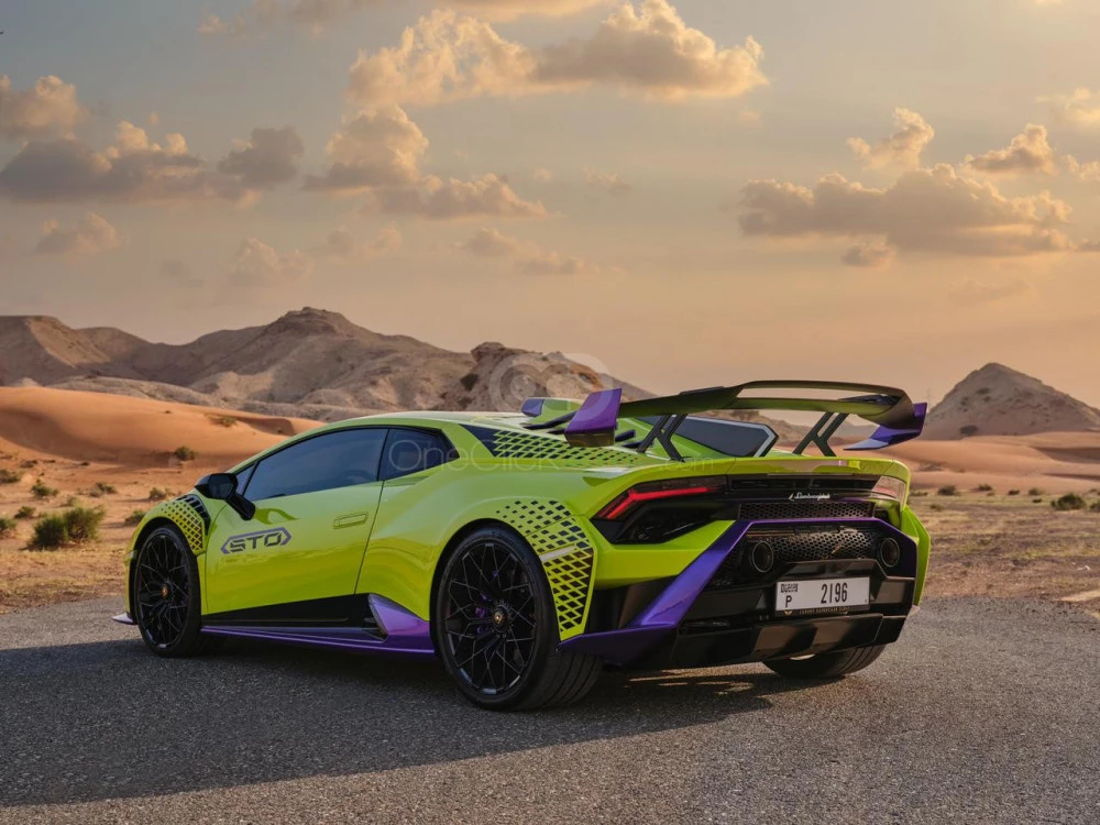Light Green Lamborghini Huracan STO 2022 for rent in Abu Dhabi 8