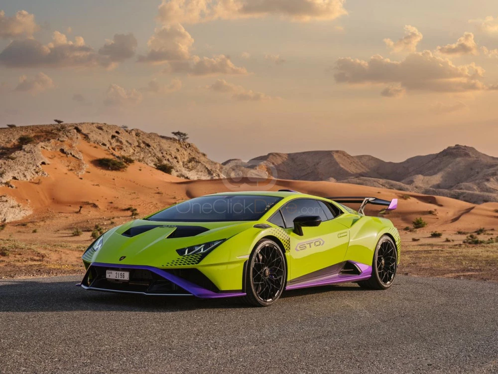 Light Green Lamborghini Huracan STO 2022 for rent in Abu Dhabi 7