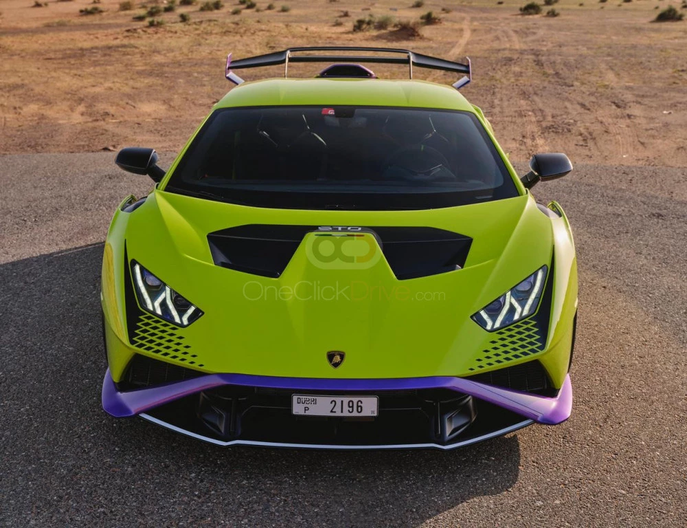 Light Green Lamborghini Huracan STO 2022 for rent in Abu Dhabi 4