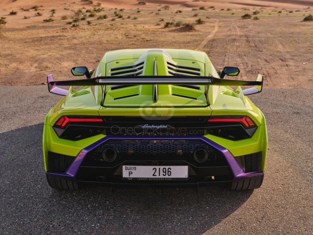 Light Green Lamborghini Huracan STO 2022 for rent in Abu Dhabi 6