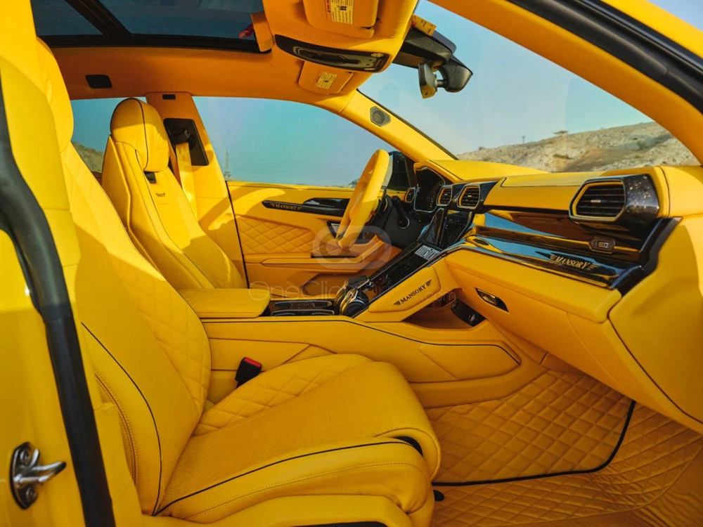 Yellow Lamborghini Urus Mansory 2021 for rent in Abu Dhabi 7