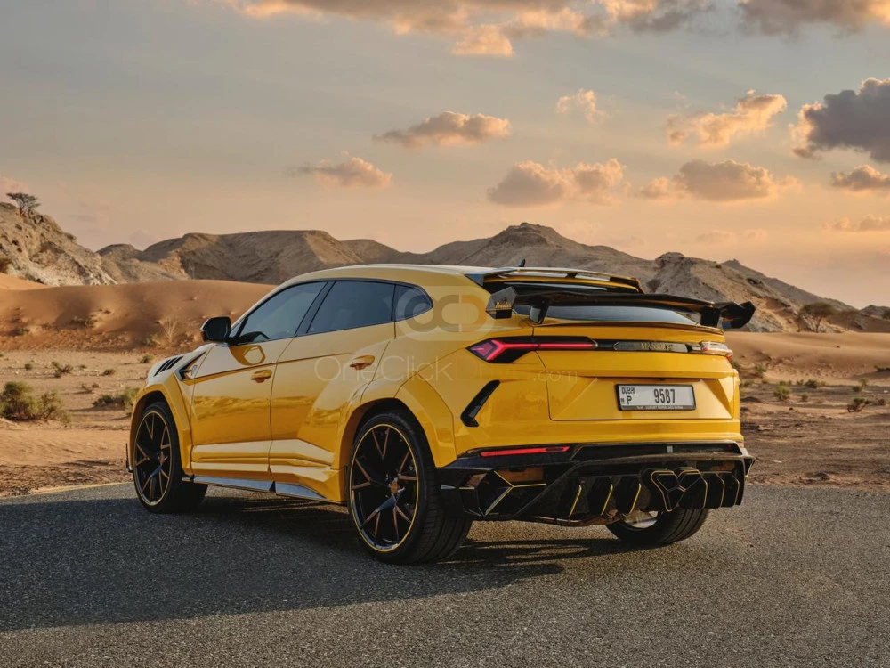 Yellow Lamborghini Urus Mansory 2021 for rent in Abu Dhabi 5