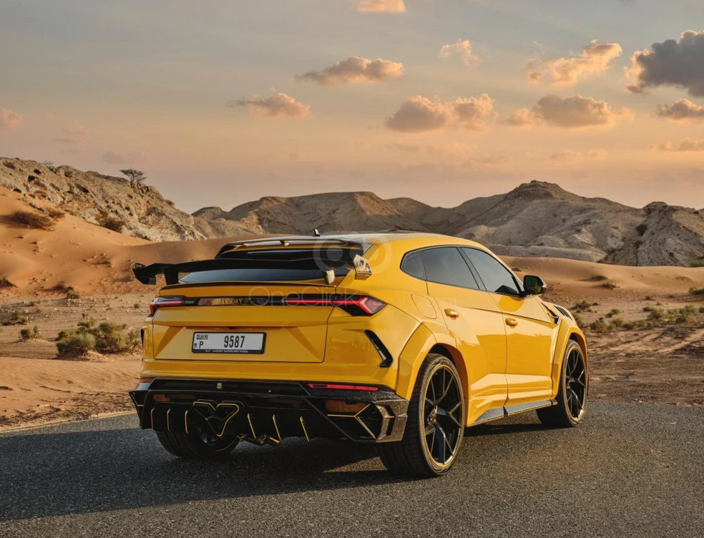 Yellow Lamborghini Urus Mansory 2021 for rent in Abu Dhabi 4