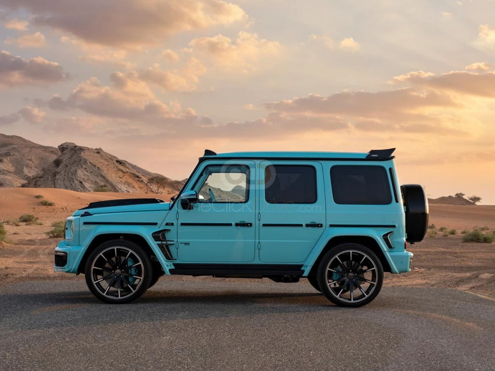 Turquoise Mercedes Benz Brabus AMG G63 2021 for rent in Dubai 7