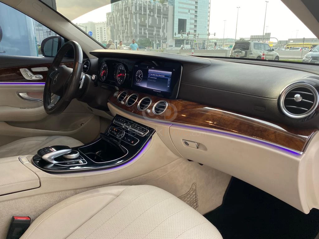 Silver Mercedes Benz E300 2018 for rent in Dubai 7