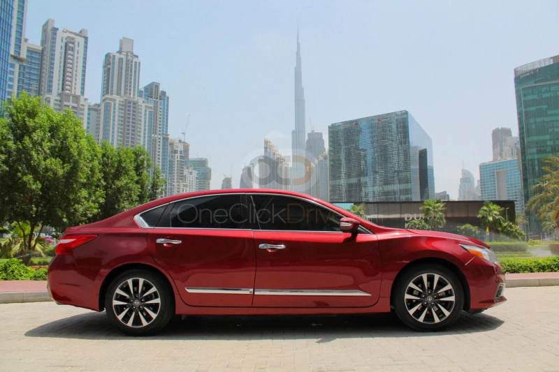 rouge Nissan Altima 2016 for rent in Sharjah 2