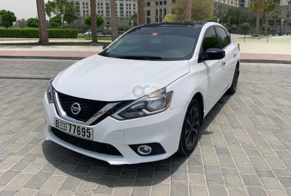 blanc Nissan Sentra 2019 for rent in Ajman 1