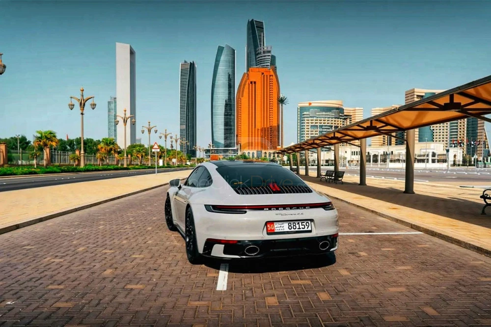Green Porsche 911 Carrera 4S 2022 for rent in Dubai 3