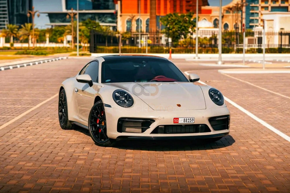 Green Porsche 911 Carrera 4S 2022 for rent in Dubai 1