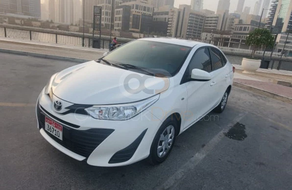 White Toyota Yaris Sedan 2019 for rent in Abu Dhabi 1