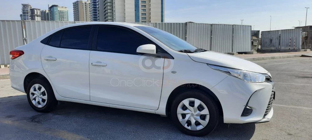 White Toyota Yaris Sedan 2021 for rent in Abu Dhabi 1